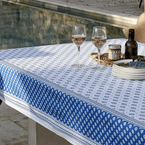 The Sormiou white and blue rectangular tablecloth makes you feel by the sea. For sale on French Bliss online shop